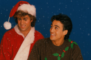 Wham in Weihnachtskostümen (KI-generiert)