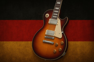 Deutschrock E-Gitarre vor deutscher Flagge mit rockiger Atmosphäre